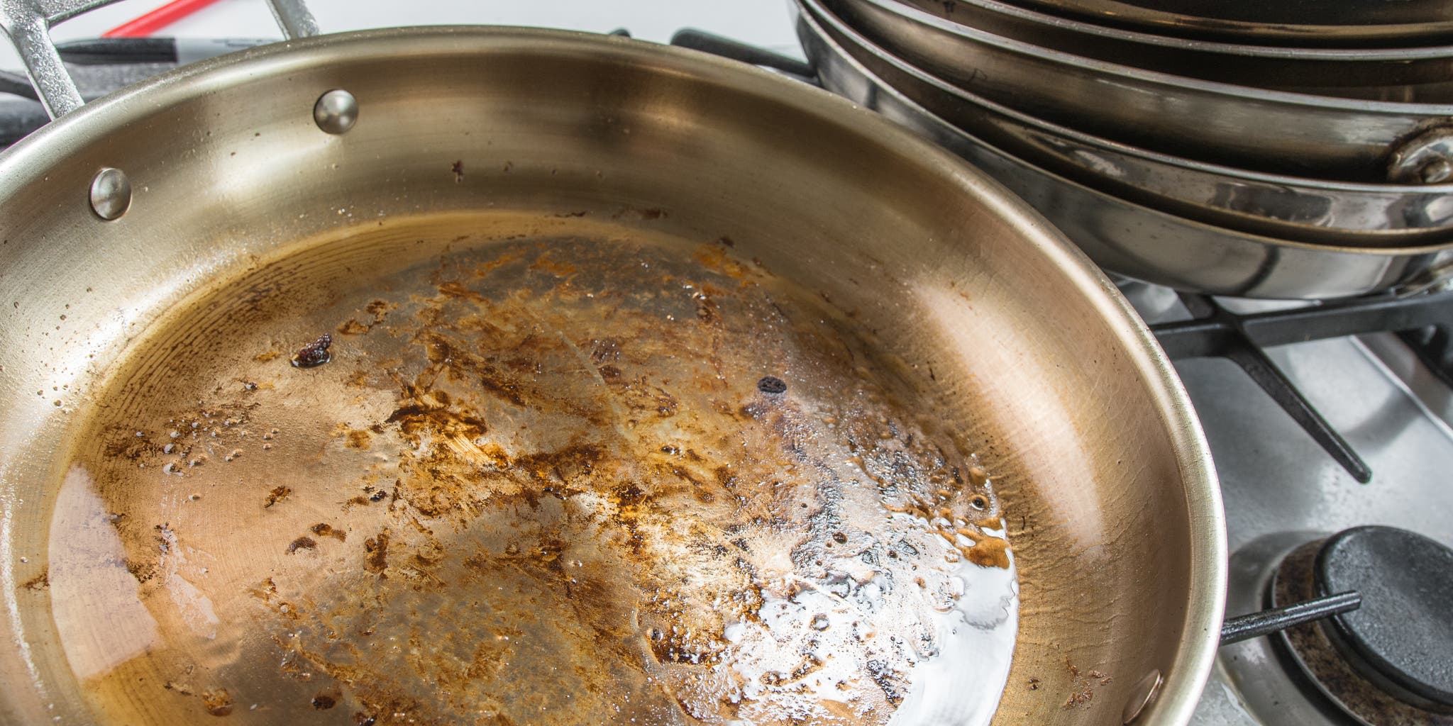 Why grease clings to cookware